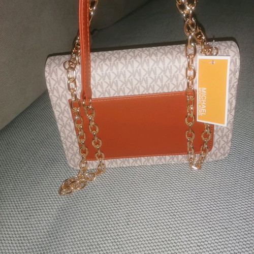 Shoulder bag used with strap for hand and shoulder