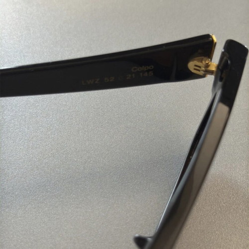 Retrosuperfuture sunglasses like new, black frame and orange lens
