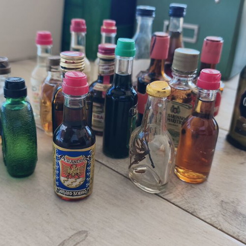 Miniature liquor bottles used, set of 21