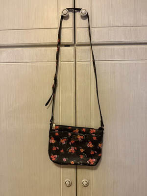 Steve Madden crossbody bag with colorful floral design, black