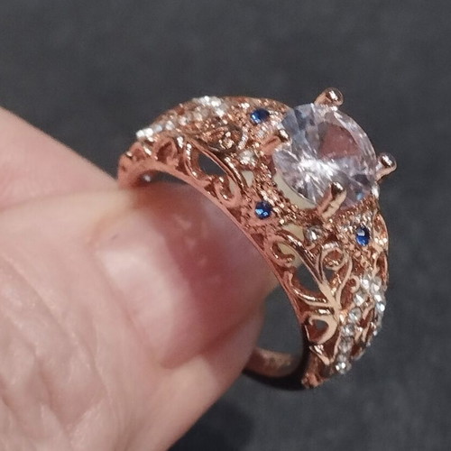 Elegance rose gold ring with white and blue stones