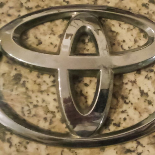 Vintage Toyota car emblem