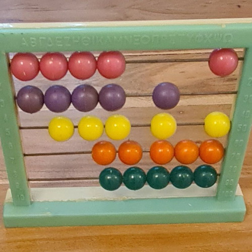 Plastic abacus up to 25 with 1980s alphabet like new
