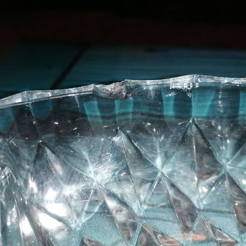 Oval glass platter for nuts used with small chip