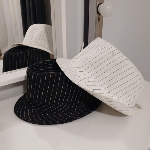 Hats like new, black and white, one size