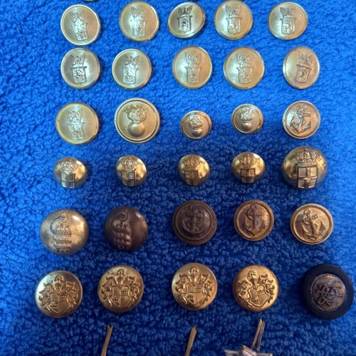 Collection of used antique and vintage brass uniform buttons