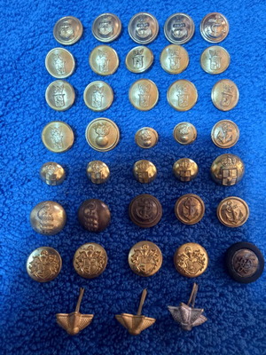 Collection of used antique and vintage brass uniform buttons