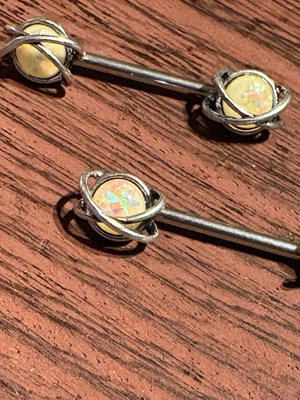 Nipple ring 14G steel refurbished with planet clasps