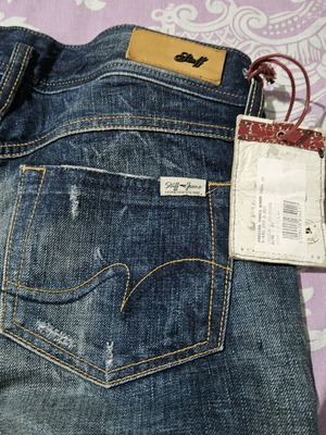 Staff blue jeans new with rips size M