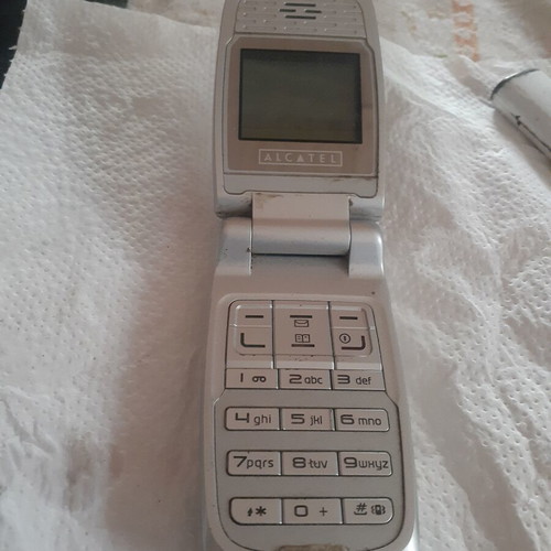 Alcatel VLS mobile phone used, no charger