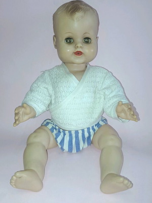 Collectible vintage baby doll from the 1950s like new