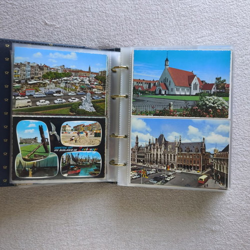 Postcard album like new with 200 postcards from around the world