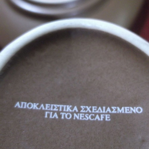 Nescafe collectible ceramic cup and saucer set like new