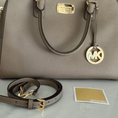 Michael Kors handbag new with shoulder strap, gray beige