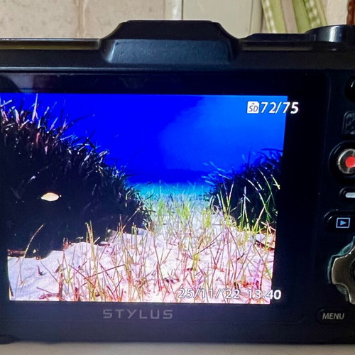 Olympus Tough GPS Camera like new with housing, torch, and base