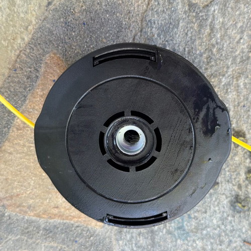 Trimmer heads used, pack of two for grass cutter