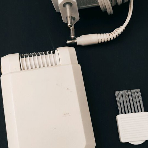 Silk epil duo plus Braun epilator used with charger and cleaning brush