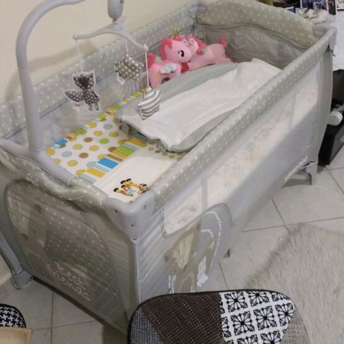 Playpen used with mattress and 2-level changing table