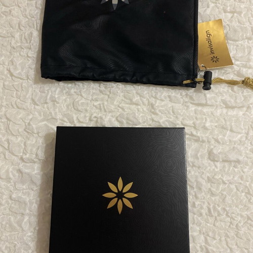 Invisalign commemorative pouch and box packaging