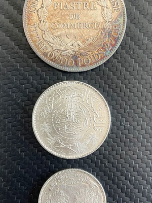 Silver coins French Indochina 1 Piastre 1909, Saudi Arabia 1 Riyal 1950, Brazil 2000 Réis 1922