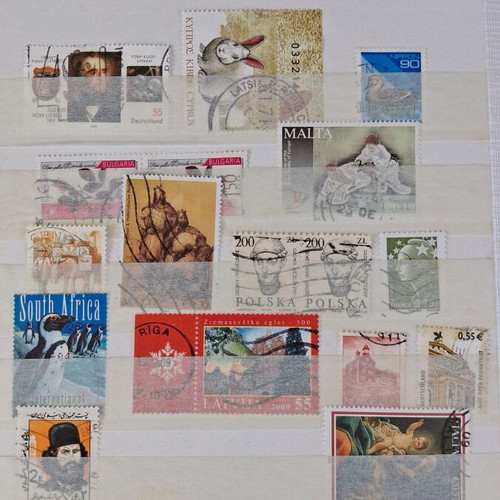 Stamp album with used worldwide collection, ideal for beginners