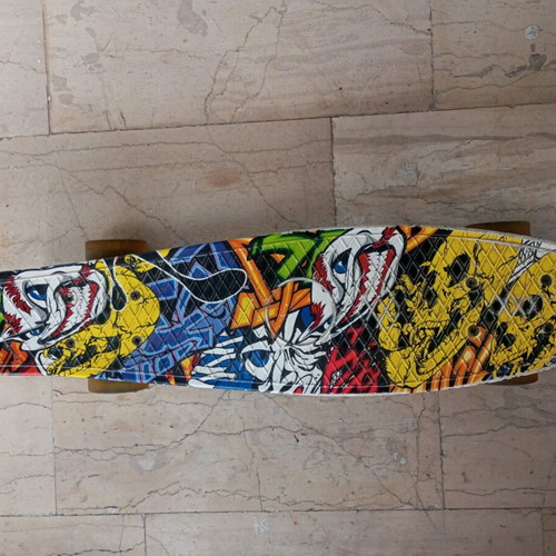 Penny Board skateboard like new with crazy graphics