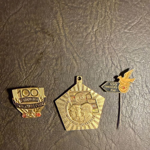 Set of 3 collectible metal badges and pins from East Germany, new