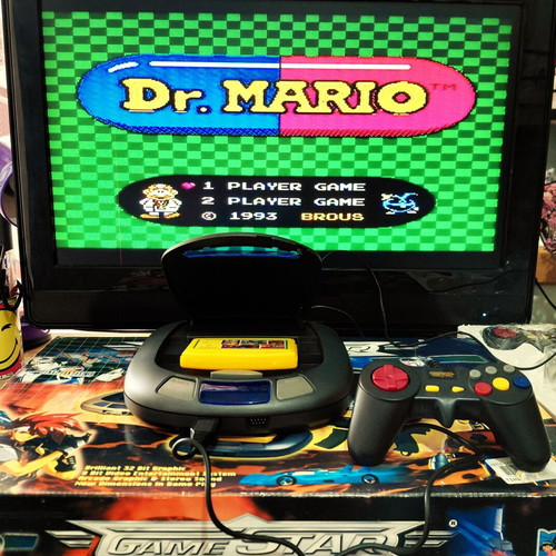 Retro 32-bit game console like new with accessories