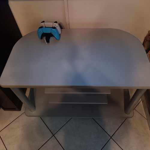 TV stand like new with wheels and 3 shelves