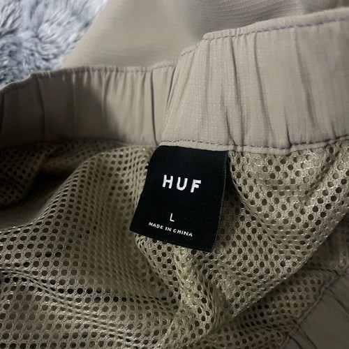 Huf Swim short running like new, size M-L, beige and purple