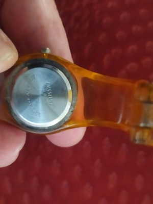 Wristwatch women's orange like new with clip fastening