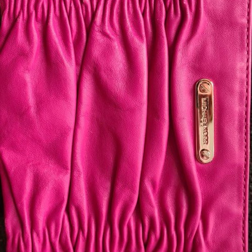 Michael Kors fuchsia crossbody bag used