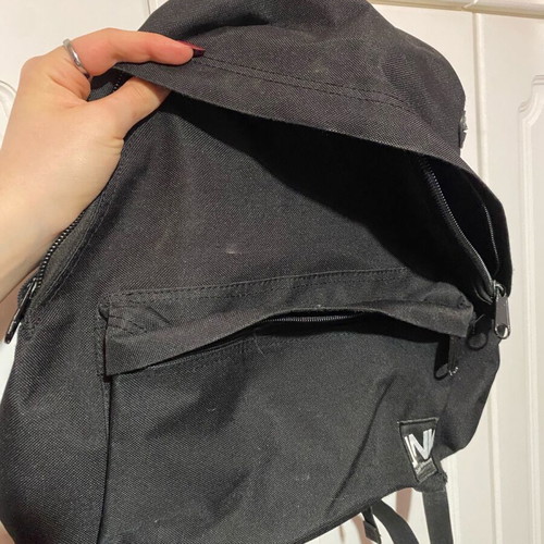 Black backpack medium-large size used