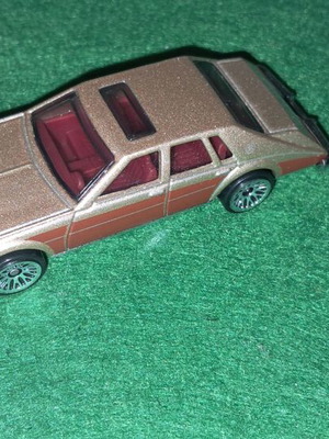 Hot Wheels Cadillac Seville toy car