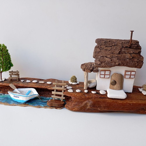 Handmade sea-themed driftwood diorama with Greek island house