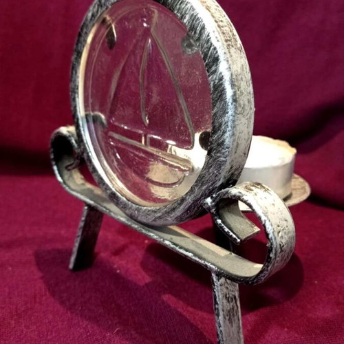 Metal tealight holder like new with glass sailboat decoration