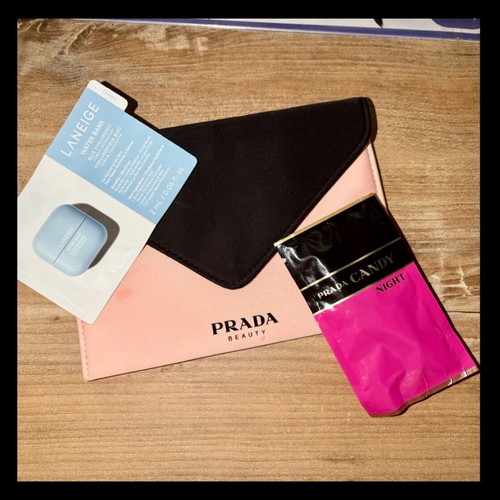 Prada toiletry bag like new with Candy perfume and Laneige product