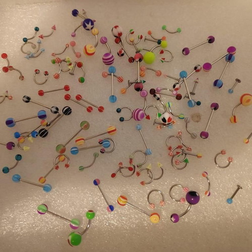 Piercing earrings set like new, 100 pieces, various designs and colors