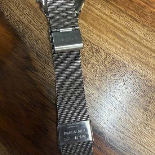 Skagen watch used with blue dial and silver bracelet
