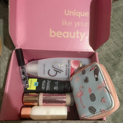Sephora black mask, Golden Rose micellar cleansing water, concealer, Frezyderm sunscreen, eyebrow gel, and wallet