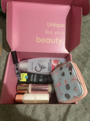 Sephora black mask, Golden Rose micellar cleansing water, concealer, Frezyderm sunscreen, eyebrow gel, and wallet