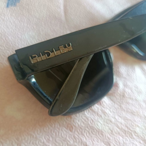 Ridley men's sunglasses with green lenses, broken frame