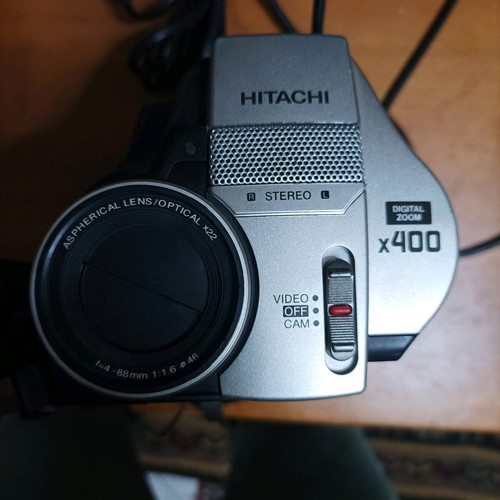 Hitachi video camera used with foldable screen and VHS cassette