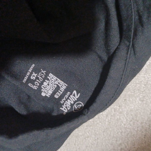 Zumba top like new, black, size XS fitting medium
