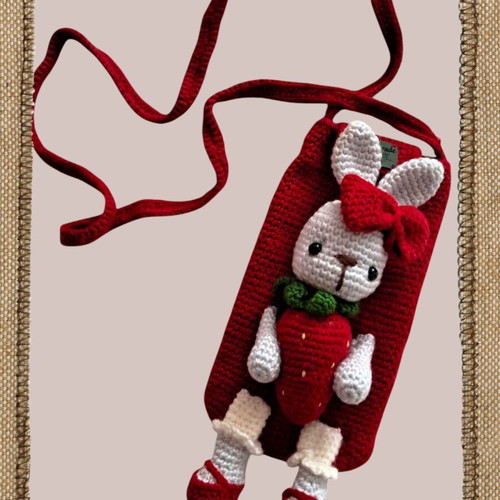 Handmade mobile phone pouch for kids.