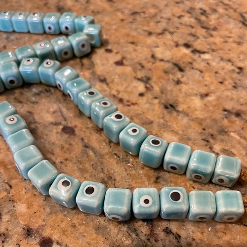Enamelled ceramic evil eye beads new, pack of 100, turquoise