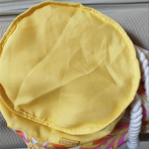 Clinique shoulder bag like new, colorful, cylindrical shape
