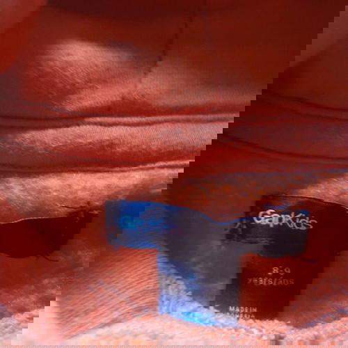 GAP kids hoodie used for ages 8-9, orange color