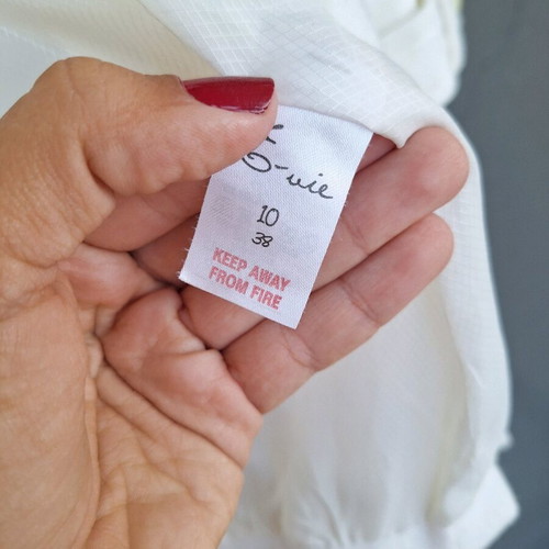 Peacocks white coat medium like new