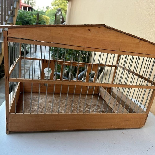 Wooden birdcage used for canaries or small birds